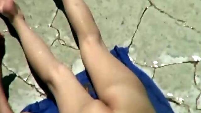 An amazing spy video of a couple having sex on a sunny day
